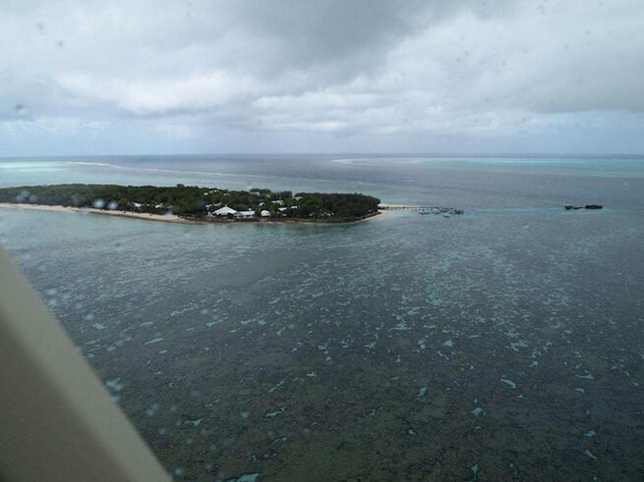 A view of Heron Island taken from a helicopter. As of 1996, 27 islands on the Great Barrier Reef supported resorts.