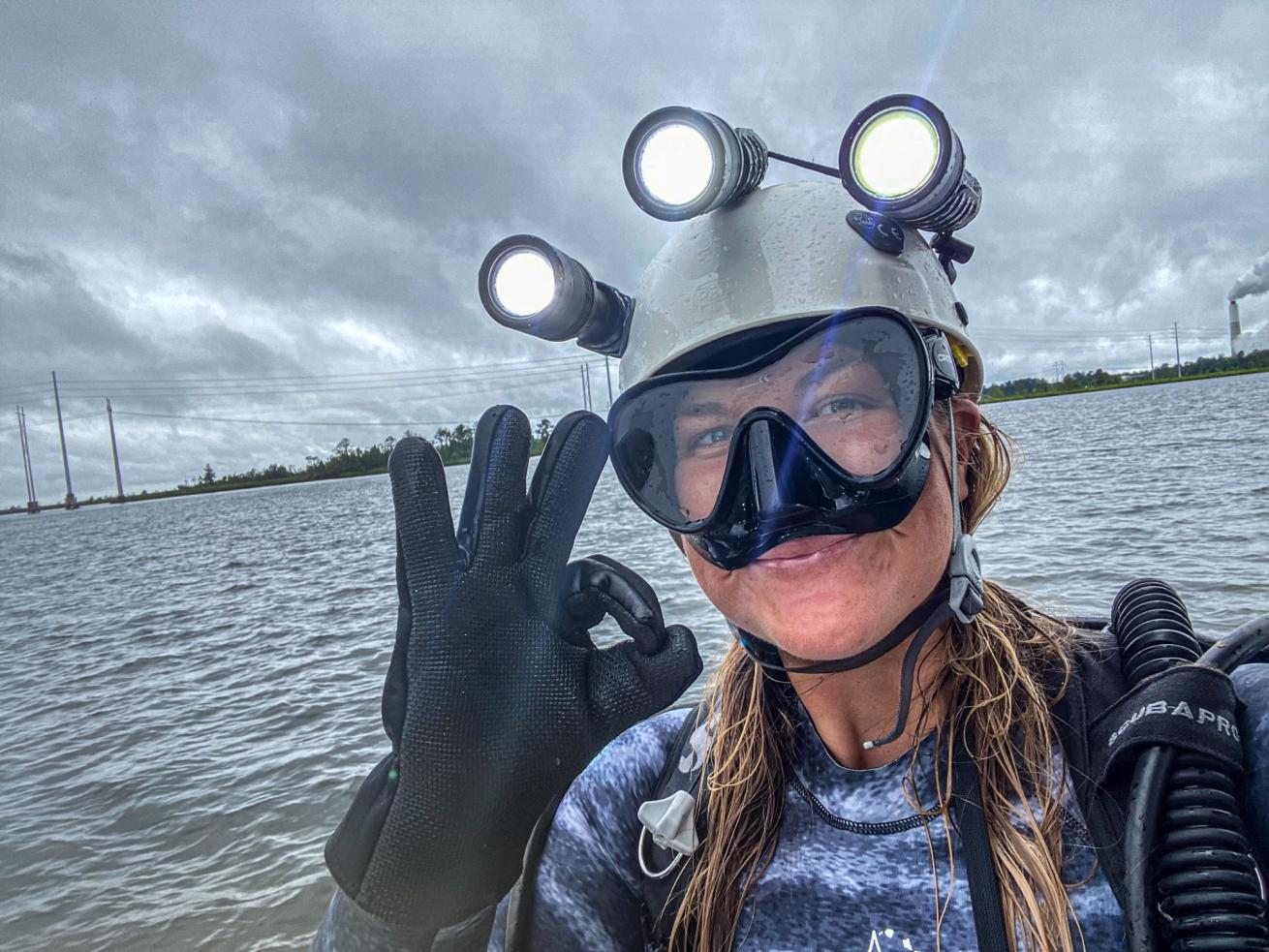 Several dive lights are necessary to look for fossils in the Cooper River.