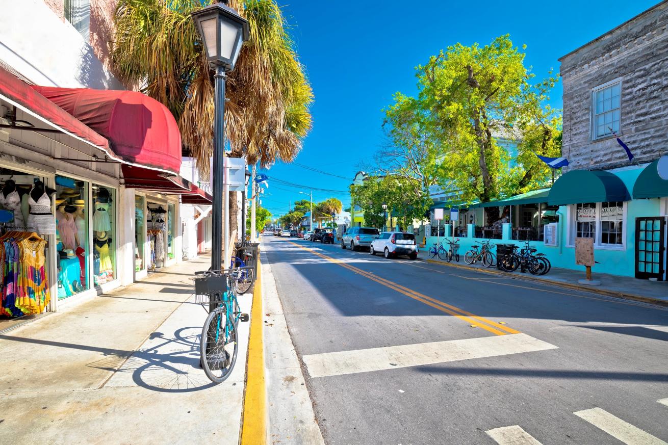 A street with shops and bicycles